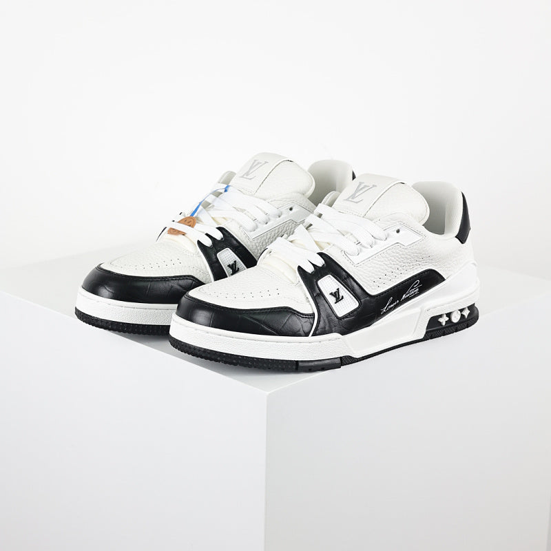 Louis Vuitton LV Trainer sneaker in white and black with signature side branding
