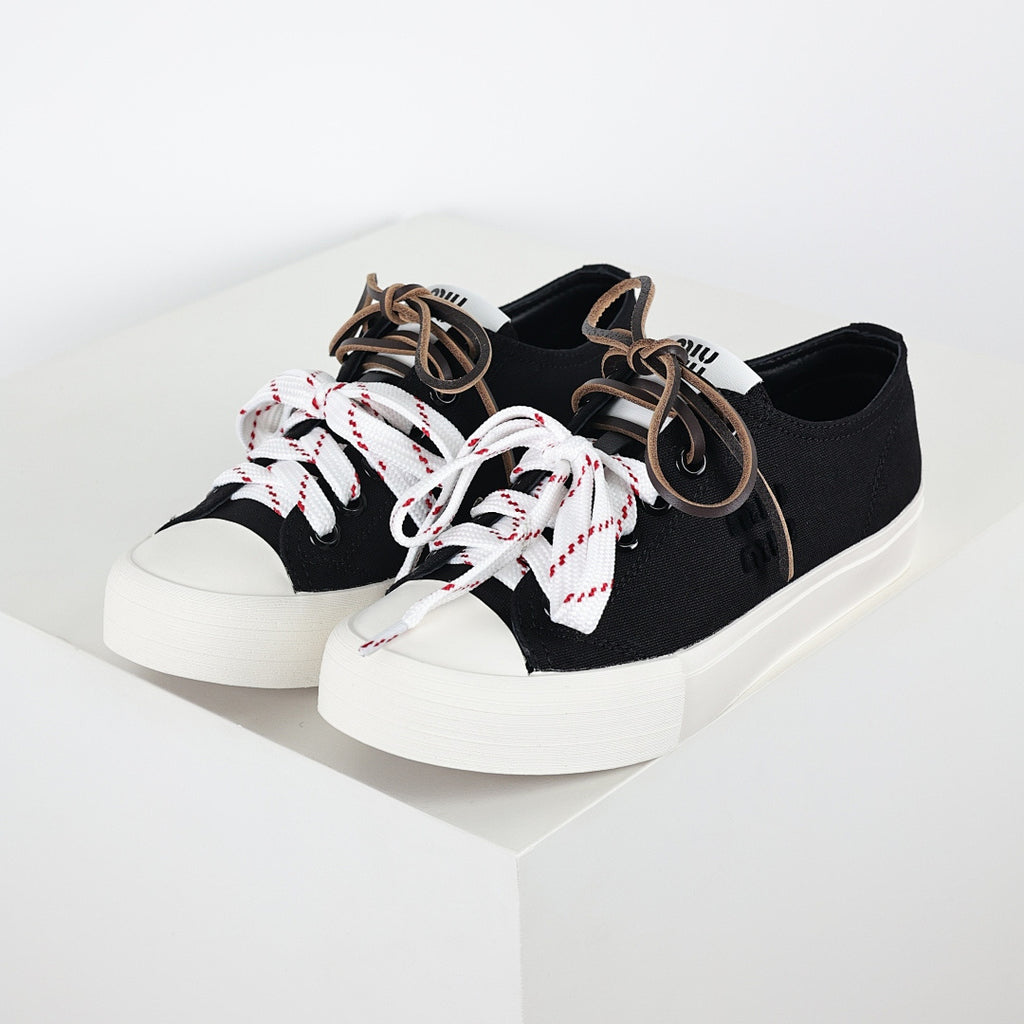 Miu Miu Canvas Low-Top Sneakers in Black