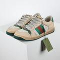 Gucci Screener Low-Top Sneakers – Distressed Leather with Green Trim & Web Stripe