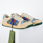 Gucci Screener Low-Top Sneakers – GG Supreme Canvas with Sky Blue Leather Trim & Green Sole