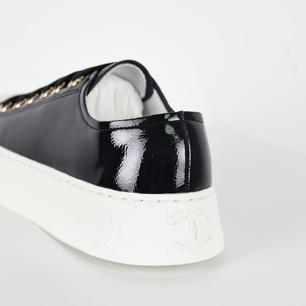 Chanel Low-Top Platform Sneakers – Black Patent Leather with Gold CC Lace Charm