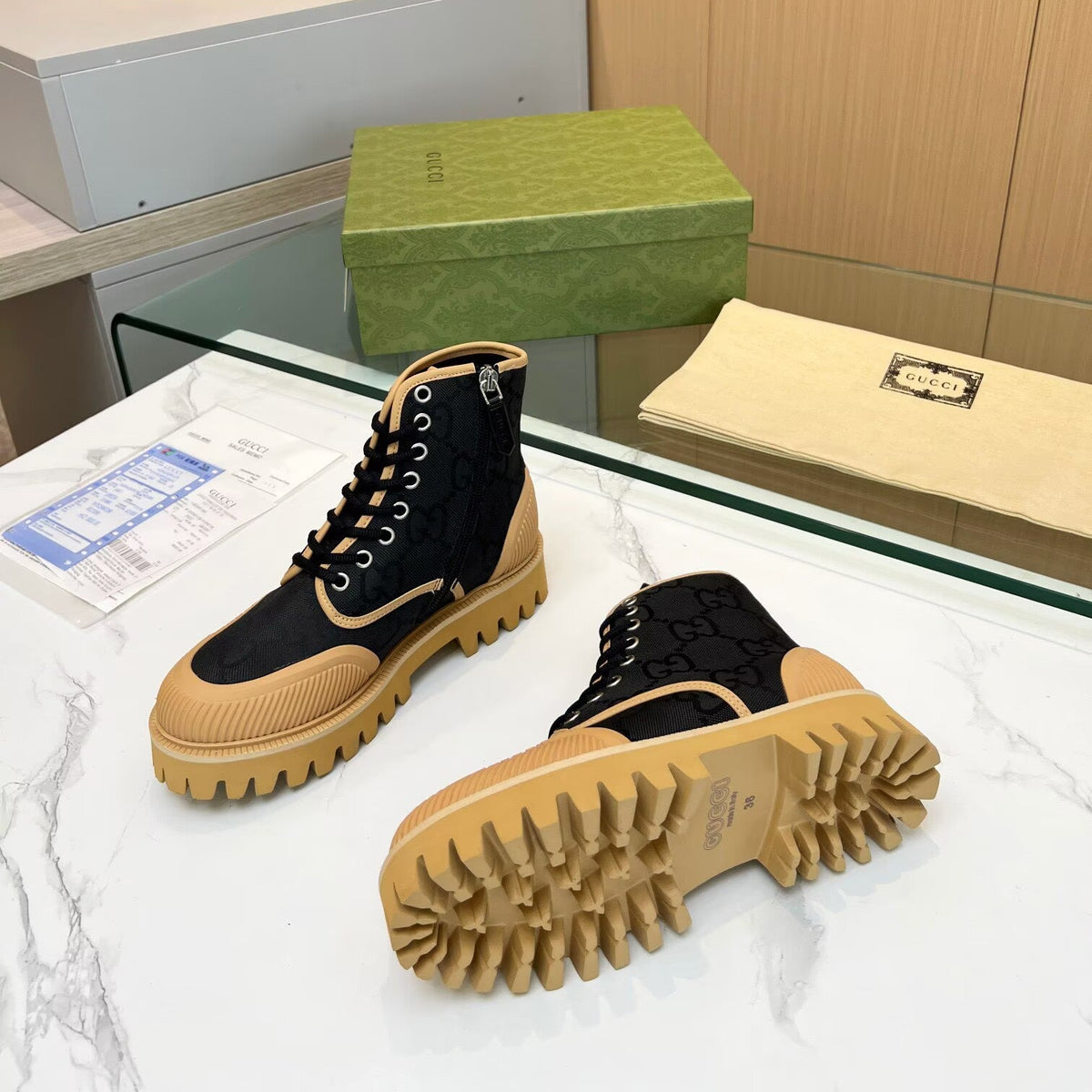Gucci Black GG Monogram Ankle Boots with Tan Lug Sole
