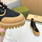 Gucci Black GG Monogram Ankle Boots with Tan Lug Sole