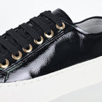 Chanel Low-Top Platform Sneakers – Black Patent Leather with Gold CC Lace Charm