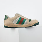Gucci Screener Low-Top Sneakers – Distressed Leather with Green Trim & Web Stripe