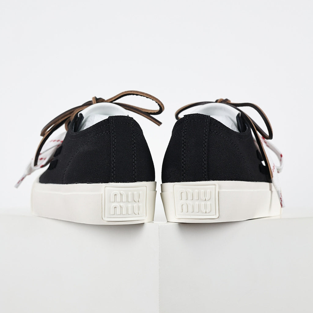 Miu Miu Canvas Low-Top Sneakers in Black
