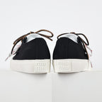 Miu Miu Canvas Low-Top Sneakers in Black